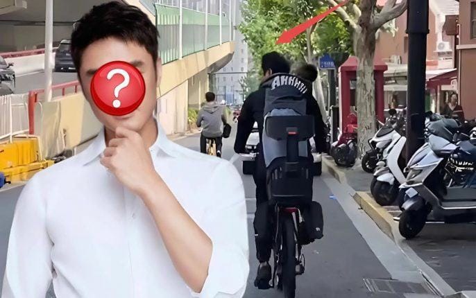 Minh Đạo gây bất ngờ khi đạp xe chở con đi học giữa phố Thượng Hải